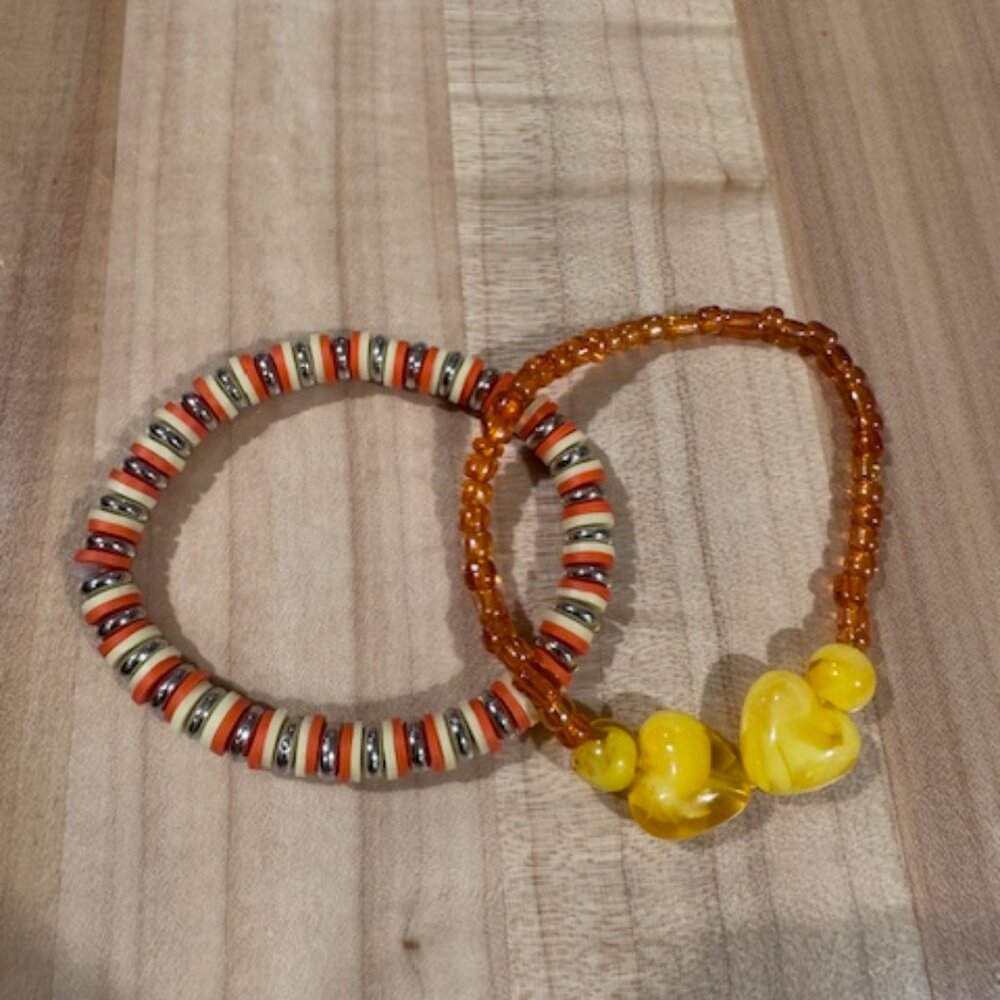 Set of two matching orange and yellow handmade bracelets